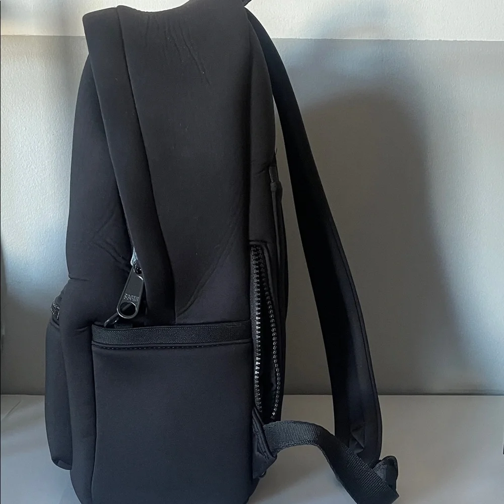 Good condition Dagne Dover Medium Dakota Neoprene Backpack for women